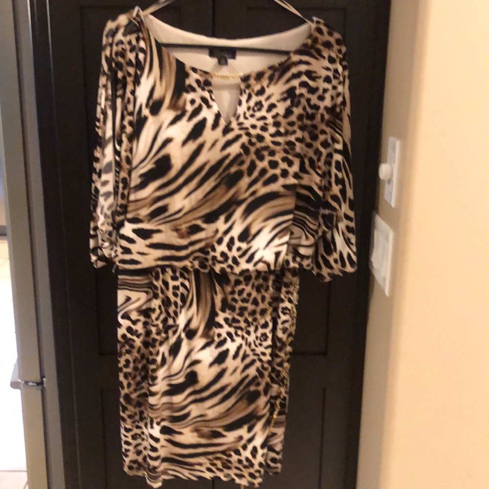 Sexy Leopard mini dress.  Perfect for holiday parties, wedding or date night!